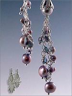 Dangling pearl cluster clip earrings